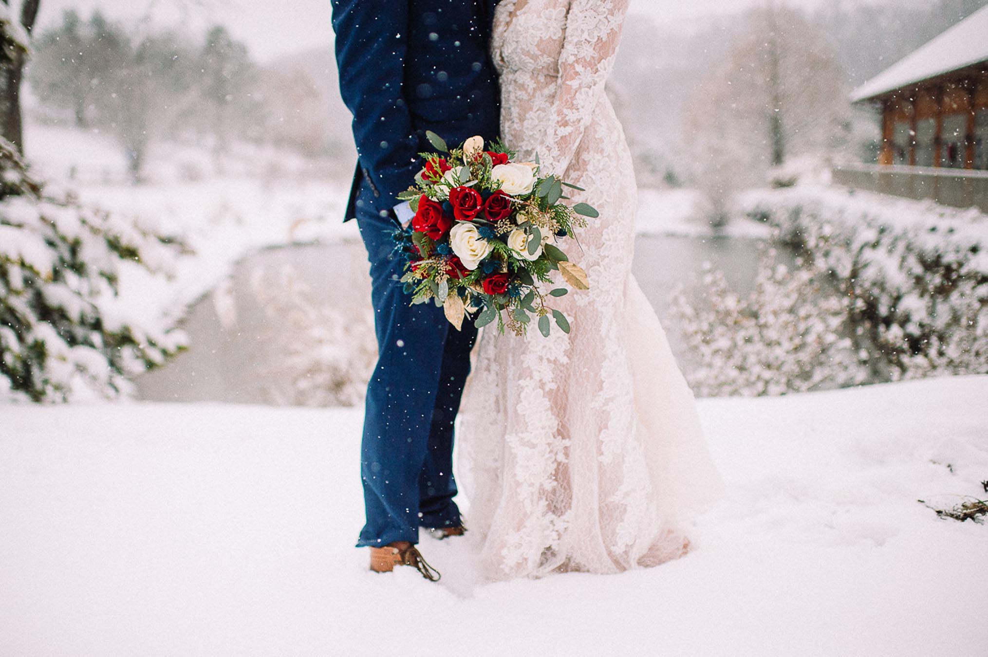 Bride and groom in snow